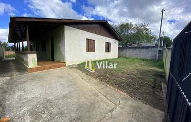 Imagem: A casa possui 4 Dormitórios, 1 Banheiro, 5 Vagas na garagem