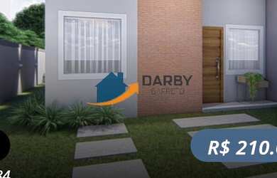 Imagem: A casa possui 2 Dormitórios, 1 Banheiro, 2 Vagas na garagem