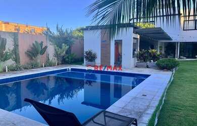 Imagem: A casa em condomínio possui 5 Dormitórios, 5 Banheiros, 4