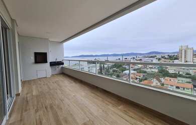 Imagem: O apartamento possui 3 Dormitórios, 2 Banheiros, 2 Vagas na