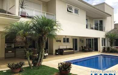 Imagem: A casa em condomínio possui 4 Dormitórios, 5 Banheiros, 4