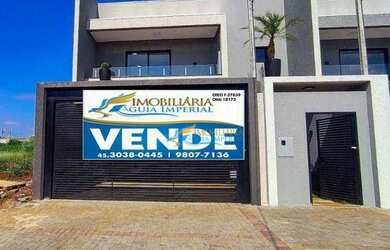 Imagem: A casa possui 3 Dormitórios, 2 Banheiros, 2 Vagas na garagem