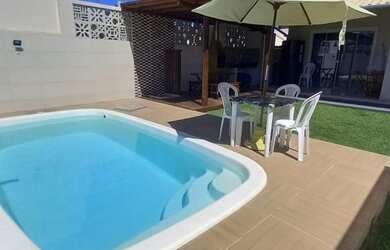 Imagem: A casa possui 4 Dormitórios, 2 Vagas na garagem e está localizado