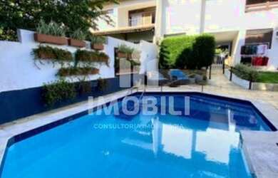 Imagem: A casa em condomínio possui 4 Dormitórios, 4 Banheiros, 4