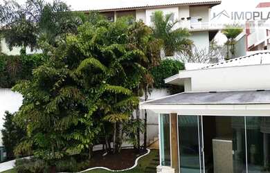 Imagem: A casa em condomínio possui 5 Dormitórios, 5 Banheiros, 5