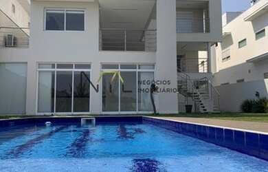 Imagem: A casa em condomínio possui 4 Dormitórios, 5 Banheiros, 5