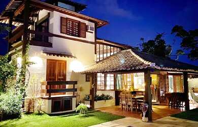 Imagem: A casa em condomínio possui 5 Dormitórios, 5 Banheiros, 2