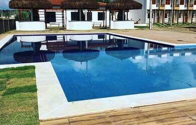 Imagem: A casa possui 3 Dormitórios, 2 Banheiros, 1 Vaga na garagem