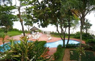 Imagem: A casa em condomínio possui 4 Dormitórios, 4 Banheiros, 2