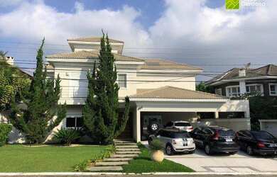 Imagem: A casa em condomínio possui 4 Dormitórios, 5 Banheiros, 5