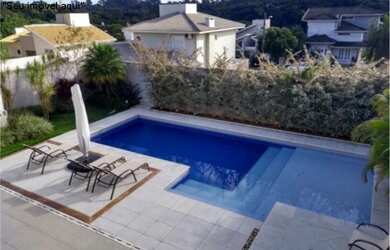 Imagem: A casa em condomínio possui 3 Dormitórios, 5 Banheiros, 3