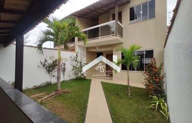 Imagem: A casa possui 3 Dormitórios, 3 Banheiros, 2 Vagas na garagem