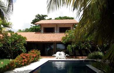 Imagem: A casa possui 5 Dormitórios, 5 Banheiros, 5 Vagas na garagem