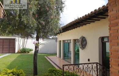 Imagem: A casa possui 3 Dormitórios, 5 Banheiros, 5 Vagas na garagem