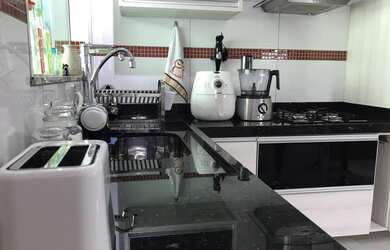 Imagem: A casa possui 2 Dormitórios, 3 Banheiros, 2 Vagas na garagem