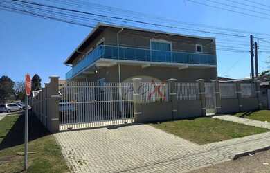 Imagem: A casa possui 5 Dormitórios, 4 Banheiros, 5 Vagas na garagem