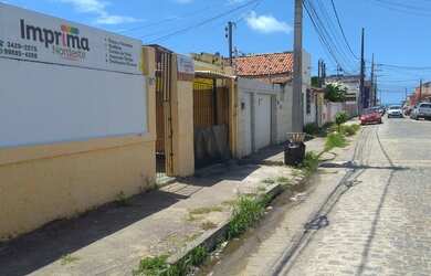 Imagem: A casa possui 3 Dormitórios, 2 Banheiros, 1 Vaga na garagem