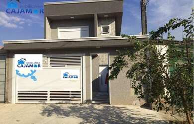 Imagem: A casa possui 4 Dormitórios, 5 Banheiros, 2 Vagas na garagem