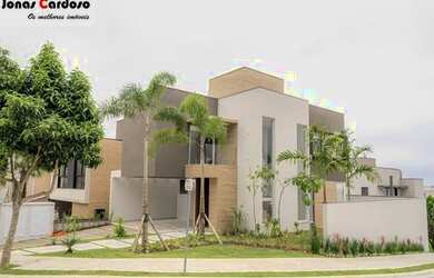 Imagem: A casa possui 4 Dormitórios, 5 Banheiros, 4 Vagas na garagem