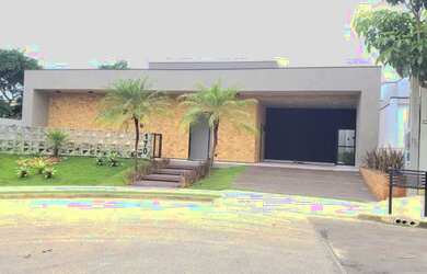 Imagem: A casa possui 3 Dormitórios, 4 Banheiros, 2 Vagas na garagem