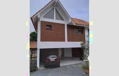 Imagem: A casa em condomínio possui 4 Dormitórios, 5 Banheiros, 4