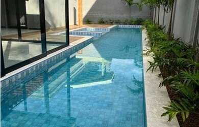 Imagem: A casa em condomínio possui 5 Dormitórios, 5 Banheiros, 4