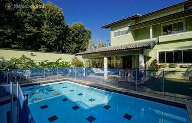 Imagem: A casa em condomínio possui 5 Dormitórios, 5 Banheiros, 4