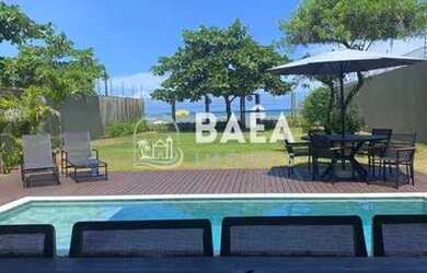 Imagem: A casa possui 4 Dormitórios, 5 Banheiros, 2 Vagas na garagem