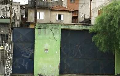 Imagem: A casa possui 4 Dormitórios, 3 Banheiros, 5 Vagas na garagem