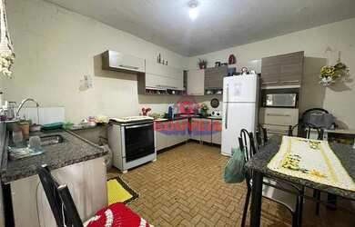 Imagem 1: Sobrado com 3 casas no quintal e salão comercial à venda, 229 m² por...