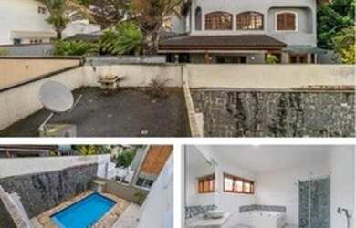 Imagem: A casa em condomínio possui 4 Dormitórios, 5 Banheiros, 2