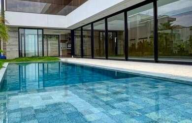 Imagem: A casa em condomínio possui 4 Dormitórios, 5 Banheiros, 4