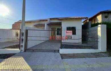 Imagem: A casa possui 3 Dormitórios, 1 Banheiro, 1 Vaga na garagem