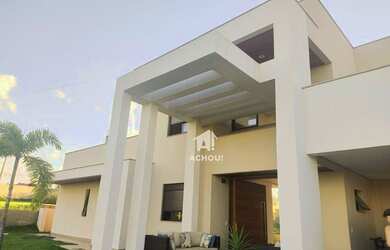 Imagem: A casa em condomínio possui 5 Dormitórios, 5 Banheiros, 300m²