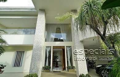 Imagem: A casa em condomínio possui 5 Dormitórios, 5 Banheiros, 4