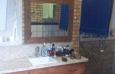 Imagem 15: Casa com grande jardim na Praia do Rosa