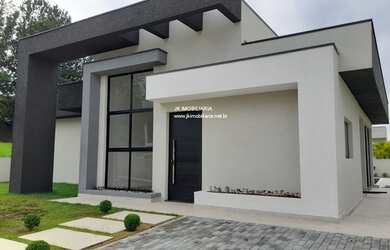 Imagem: A casa possui 4 Dormitórios, 3 Banheiros, 186m² de Área e