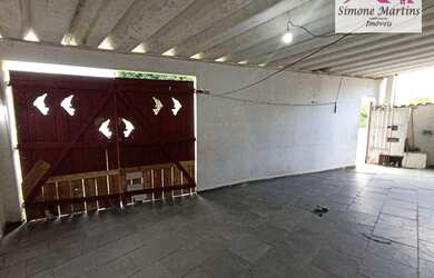 Imagem: A casa possui 2 Dormitórios, 1 Banheiro, 2 Vagas na garagem