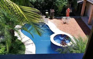 Imagem: A casa em condomínio possui 5 Dormitórios, 3 Banheiros, 4