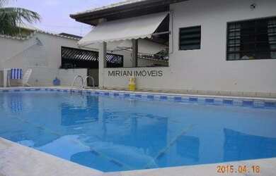 Imagem 2: Casa com piscina para venda em Peruibe com 4 dormitórios sendo 4 suítes, 2 salas, 5 banhei
