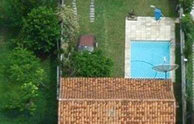 Imagem: A casa possui 3 Dormitórios, 3 Banheiros, 5 Vagas na garagem