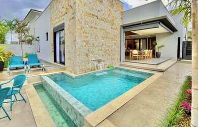 Imagem: A casa em condomínio possui 4 Dormitórios, 5 Banheiros, 4