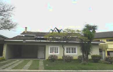 Imagem: A casa em condomínio possui 4 Dormitórios, 4 Banheiros, 4