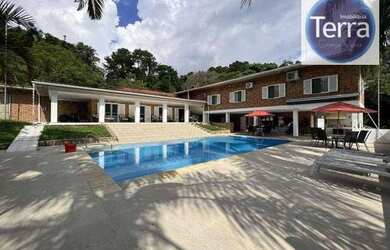 Imagem: A casa em condomínio possui 5 Dormitórios, 4 Banheiros, 5