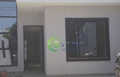 Imagem: A casa possui 3 Dormitórios, 2 Banheiros, 2 Vagas na garagem