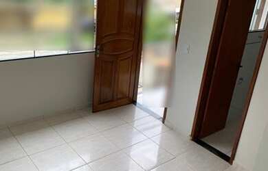 Imagem: A casa possui 2 Dormitórios, 3 Banheiros, 1 Vaga na garagem