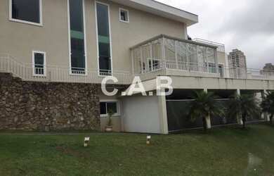 Imagem: A casa em condomínio possui 5 Dormitórios, 5 Banheiros, 5