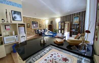 Imagem: A casa possui 5 Dormitórios, 4 Banheiros, 3 Vagas na garagem