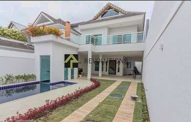 Imagem: A casa em condomínio possui 5 Dormitórios, 5 Banheiros, 5