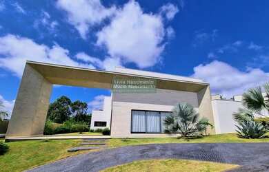 Imagem: A casa em condomínio possui 4 Dormitórios, 5 Banheiros, 5